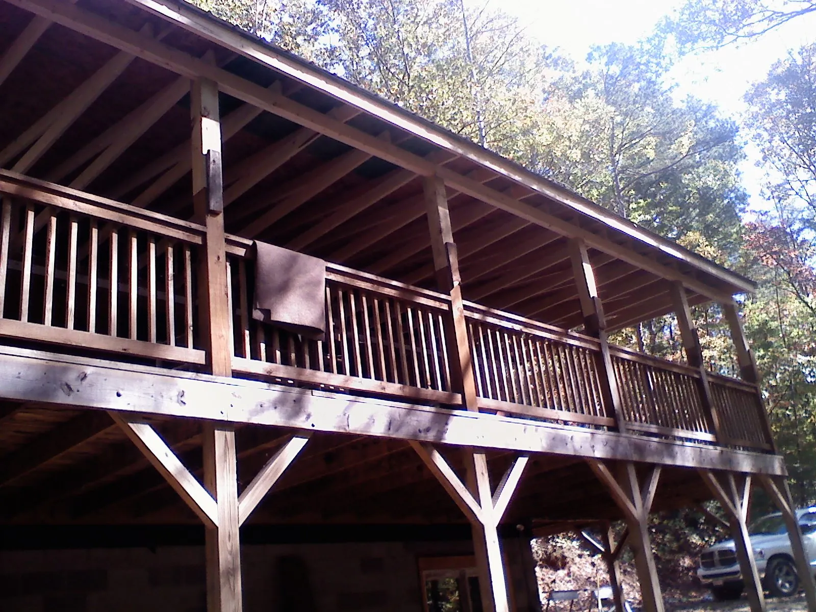 Timber framing under a new elevated porch and deck — Roof Leak Repair in Barnes City by Roofing Brothers